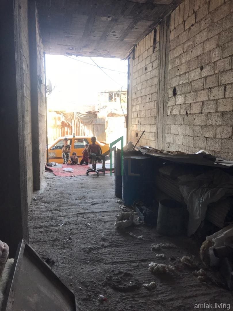 محل في حزة للبيع